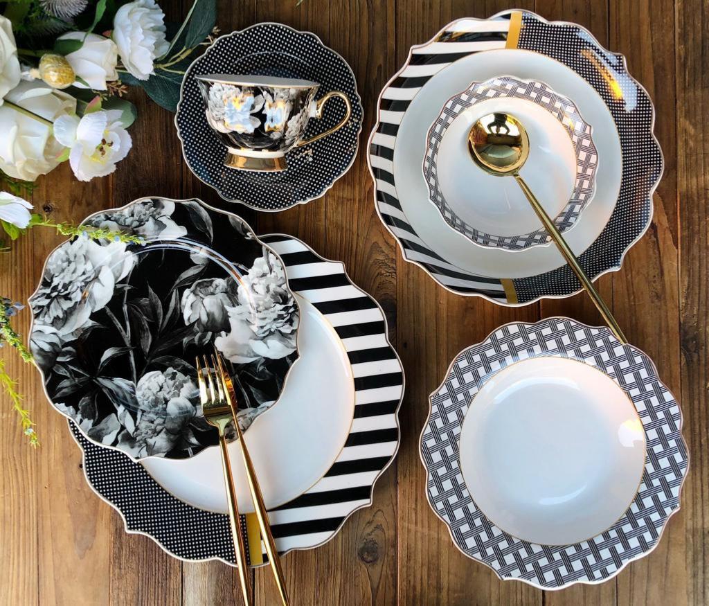 Service de table en porcelaine 25 pièces noir avec motif fleurs blanche